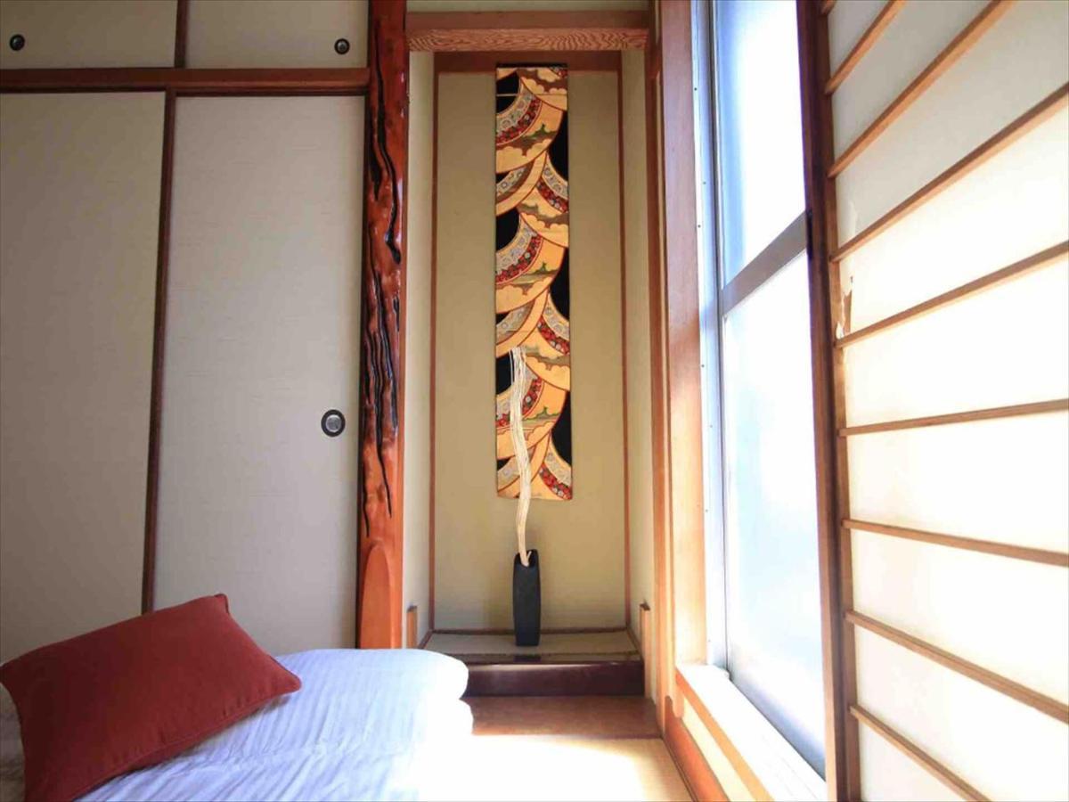 Apartament Goraku Shinfu-Kae Osaka Zewnętrze zdjęcie